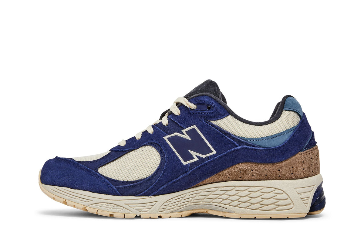 New Balance 2002R Light Cream Purple sneaker afbeelding 3 - stylecode M2002RG