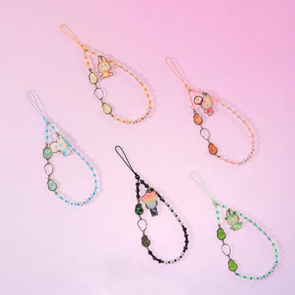 Overzicht van de 6 phone charms uit de Big into Energy Series: Happiness, Love, Loyalty, Serenity, Hope en Luck