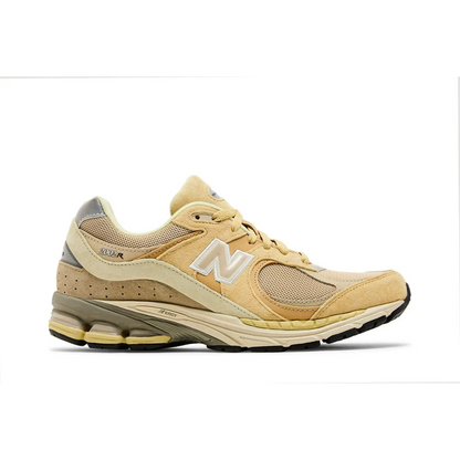 New Balance 2002R AURALEE Yellow Beige sneaker 1 - stylecode M2002RE1